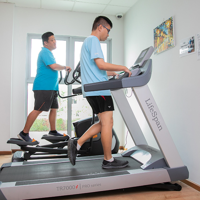 Adults on the spectrum exercising on treadmills at a Day Activity Centre