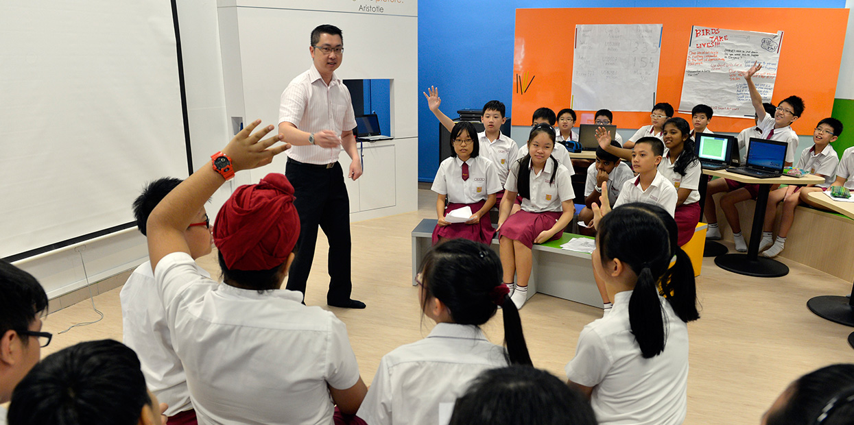 Students having an interactive lesson in a mainstream school