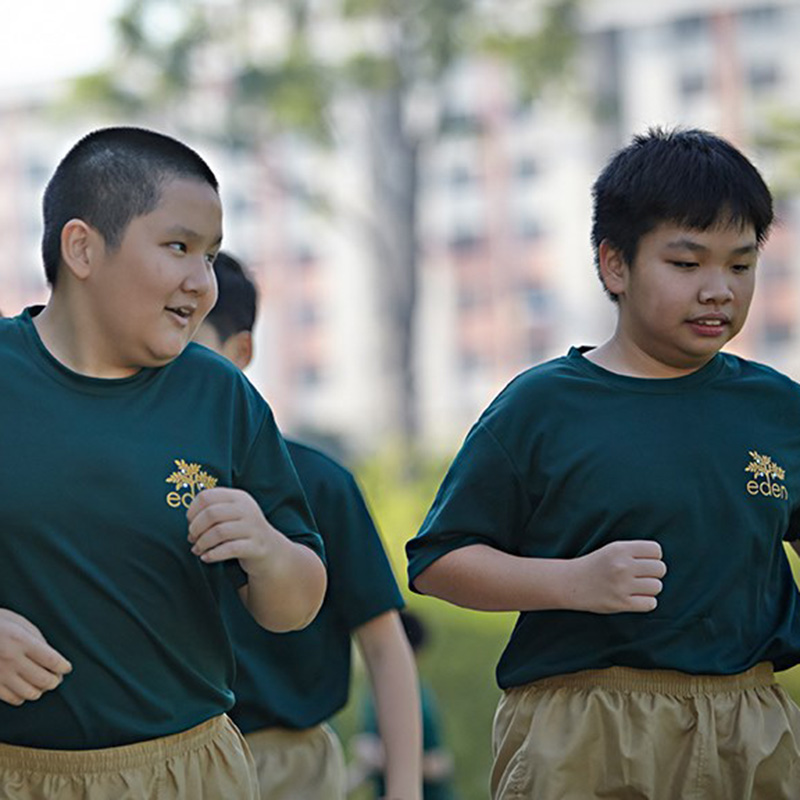 Students at Eden School jogging as part of their physical education activities